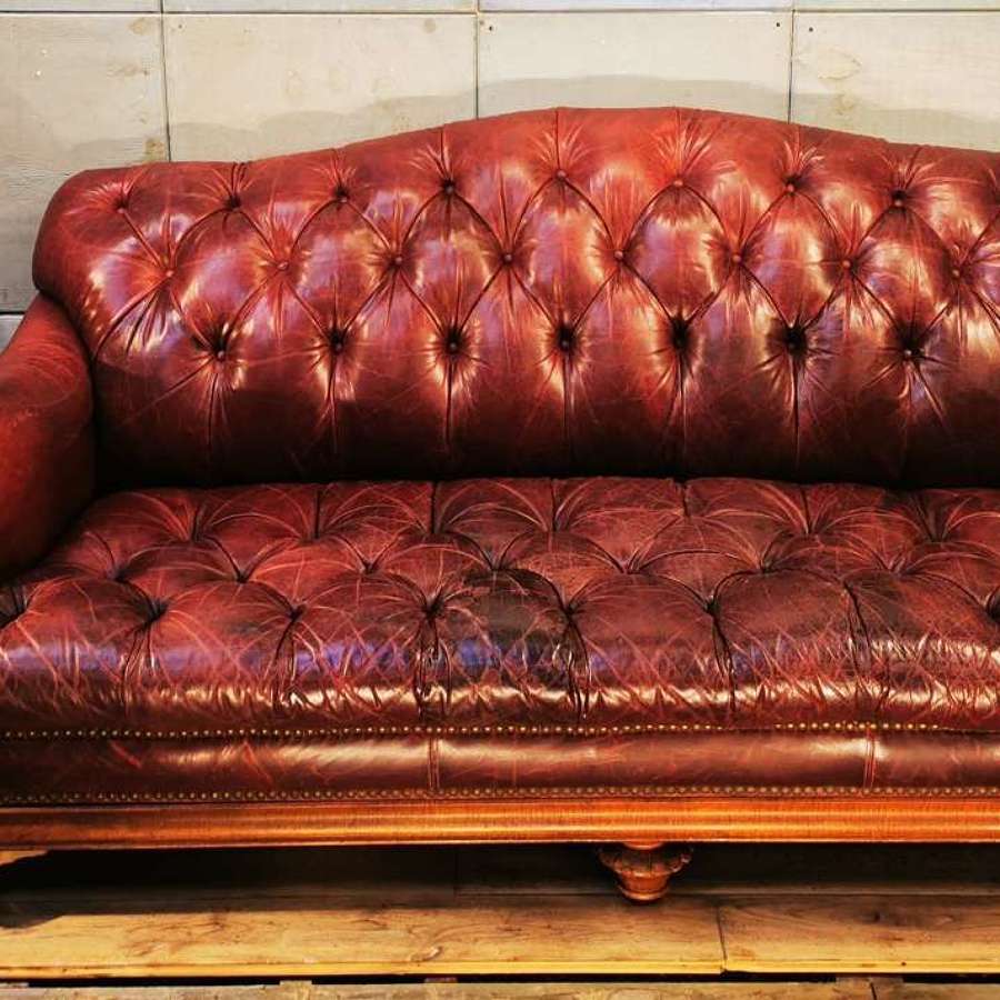 A Stunning Vintage Ox Blood red Chesterfield sofa