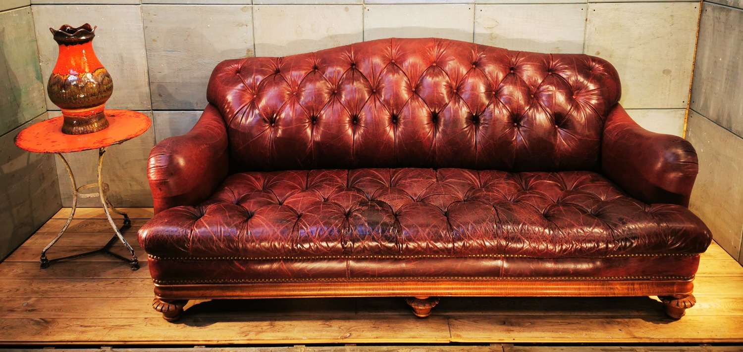 A Stunning Vintage Ox Blood red Chesterfield sofa