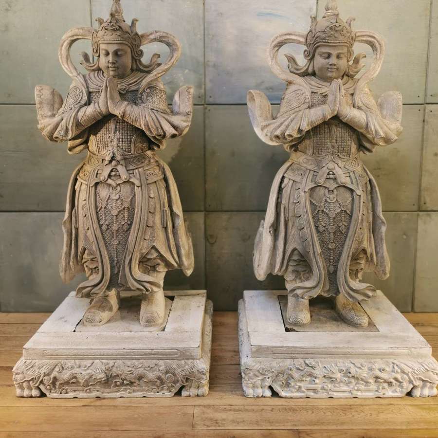 Pair of antique carved wood figures