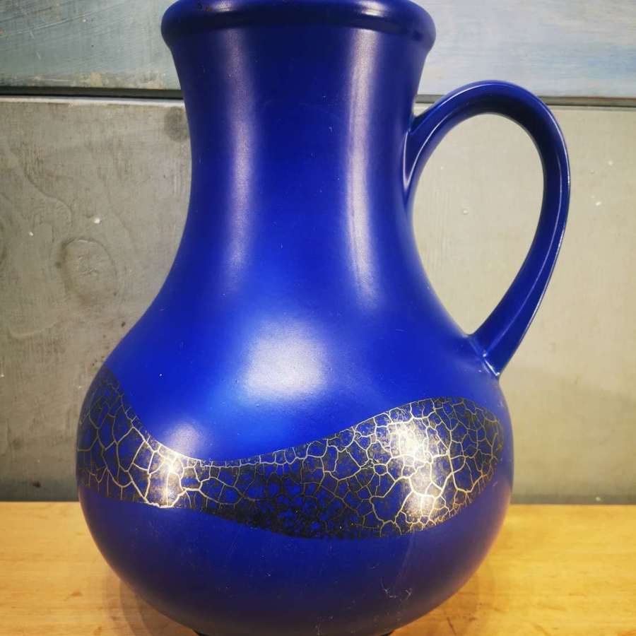 A lovely vintage deep cobalt blue handled vase perfect for sunflowers