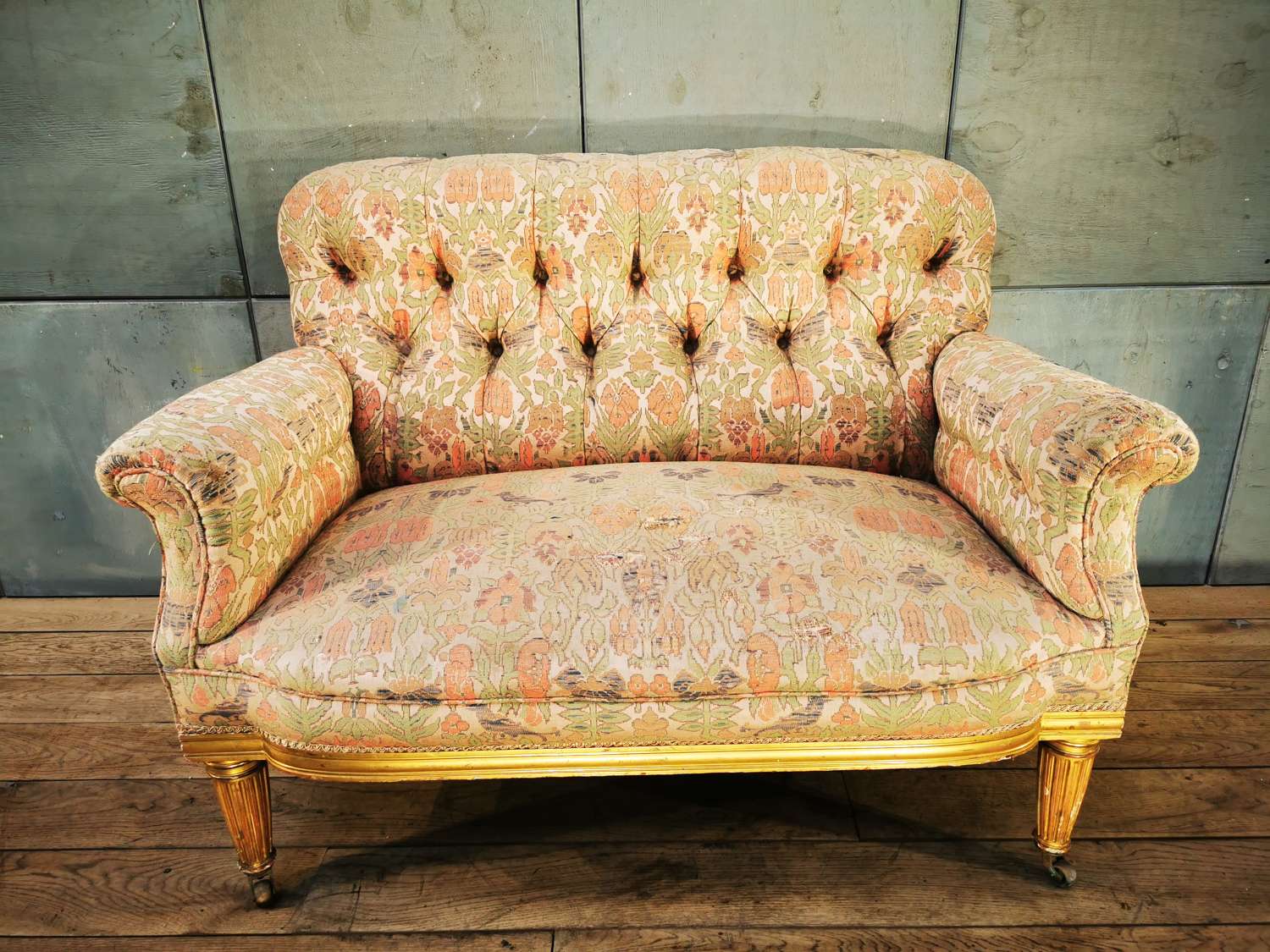 Small size gilded walnut upholstered sofa